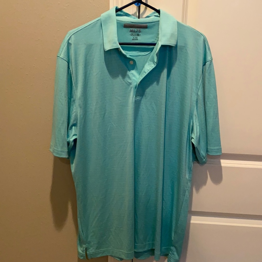 Greg Norman gold shirt